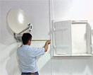 La pose d'une antenne parabolique