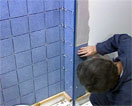 La pose d'un carrelage au mur